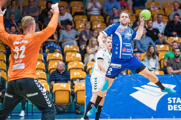 Thomas Pavlicek 2 Dessau Rosslauer HV 06 , Justin Merlin Rundt 32 HG Hamburg Barmbek during the match in the 3 League Handball Men Season 2019 2020 between Dessau Rosslauer HV 06 and TV 05 07 Hüttenberg in the Anhalt Arena on 8 September 2019 in Dessau Rosslau, Saxony Anhalt, Germany
