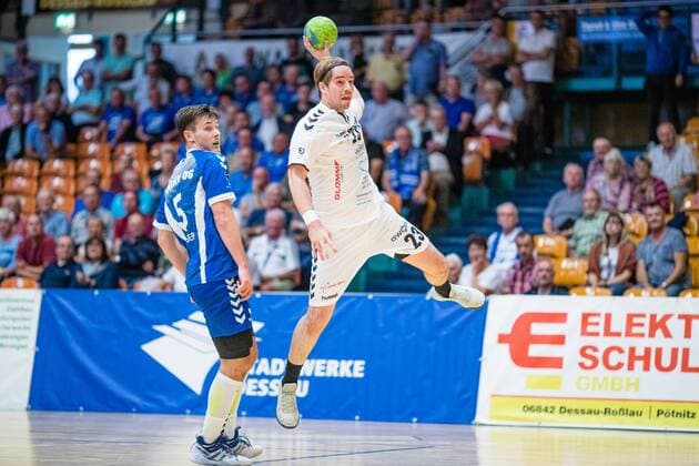 Lasse Kohnagel 23 HG Hamburg Barmbek on the ball with Timo Löser 5 Dessau Rosslauer HV 06 during the match in the 3 League Handball Men Season 2019 2020 between Dessau Rosslauer HV 06 and TV 05 07 Hüttenberg in the Anhalt Arena on 8 September 2019 in Dessau Rosslau, Saxony Anhalt, Germany