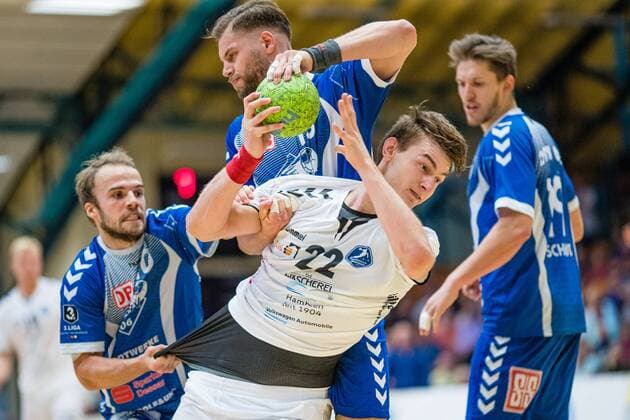 Vincent Sohmann 10 Dessau Rosslauer HV 06 , Arne Eschweiler 22 HG Hamburg Barmbek und Tim Bielzer 13 Dessau Rosslauer HV 06 on the ball during the match in the 3 League Handball Mens Season 2019 2020 between Dessau Rosslauer HV 06 and TV 05 07 Hüttenberg in the Anhalt Arena on 8 September 2019 in Dessau Rosslau, Saxony Anhalt, Germany
