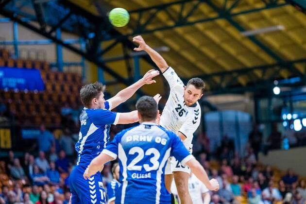 Lasse Kohnagel 23 HG Hamburg Barmbek , Daniel Schmidt 19 Dessau Rosslauer HV 06 , Lennert Gliese 23 Dessau Rosslauer HV 06 during the match in the 3 League Handball Mens Season 2019 2020 between Dessau Rosslauer HV 06 and TV 05 07 Hüttenberg in the Anhalt Arena on 8 September 2019 in Dessau Rosslau, Saxony Anhalt, Germany