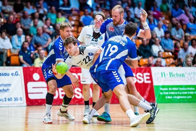 Arne Eschweiler 22 HG Hamburg Barmbek on the ball with Jakub Hrstka 6 Dessau Rosslauer HV 06 , Libor Hanisch 7 Dessau Rosslauer HV 06 , Daniel Schmidt 19 Dessau Rosslauer HV 06 during the match in the 3 League Handball Men Season 2019 2020 between Dessau Rosslauer HV 06 and TV 05 07 Hüttenberg in the Anhalt Arena on 8 September 2019 in Dessau Rosslau, Saxony Anhalt, Germany