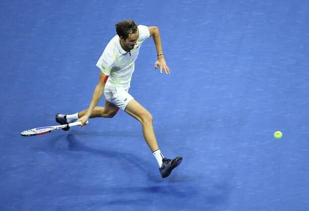 (190909) -- NEW YORK, Sept. 9, 2019 -- Daniil Medvedev of Russia hits a return during the men s singles final match between Rafael Nadal of Spain and Daniil Medvedev of Russia at the 2019 US Open in New York, the United States, Sept. 8, 2019. ) (SP)US-NEW YORK-TENNIS-US OPEN-MEN S SINGLES-FINAL LiuxJie 