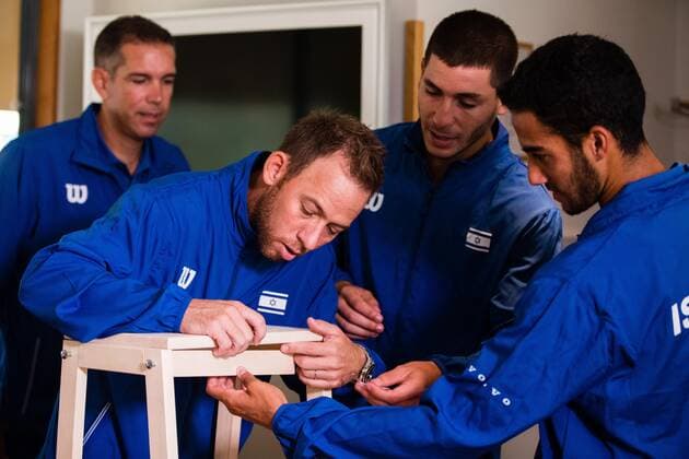 2019 Davis Cup Sweden v Israel 190912 Dudi Sela ISR , Yshai Oliel ISR and Daniel Cukierman ISR assembles a chair from IKEA ahead of the draw ceremony on September 12, 2019 in Stockholm,  Copyright: ANDREASxLxERIKSSON BB190912AE018