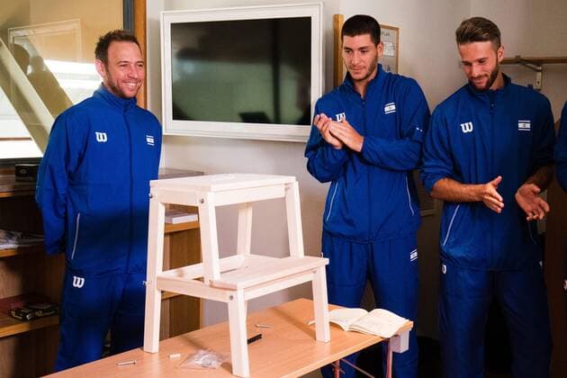 2019 Davis Cup Sweden v Israel 190912 Dudi Sela ISR , Yshai Oliel ISR and Edan Leshem ISR assembles a chair from IKEA ahead of the draw ceremony on September 12, 2019 in Stockholm,  Copyright: ANDREASxLxERIKSSON BB190912AE028