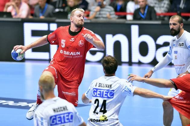 Julius Kuehn MT Melsungen at litter Zeljko Musa SC Magdeburg R , GER, MT Melsungen SC Magdeburg, Handball, 1 Bundesliga Men, 12 09 2019, GER, MT Melsungen SC Magdeburg, Handball, 1 Liga Men, 12 09 2019 Kassel Copyright: xEIBNER RolandxSippelx EP_RSL