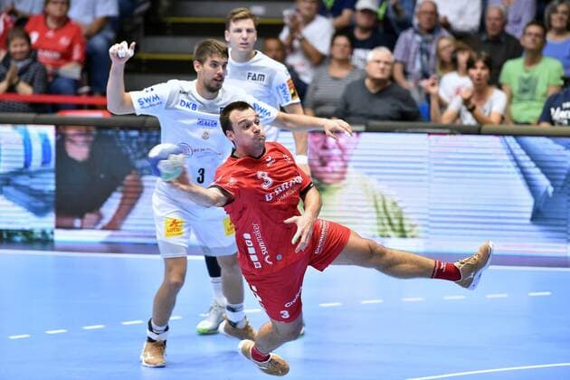 Marino Maric MT Melsungen at litter Piotr Chrapkowski SC Magdeburg and Christoph Steinert SC Magdeburg rear, GER, MT Melsungen SC Magdeburg, Handball, 1 Bundesliga Men, 12 09 2019, GER, MT Melsungen SC Magdeburg, Handball, 1 Liga Men, 12 09 2019 Kassel Copyright: xEIBNER RolandxSippelx EP_RSL