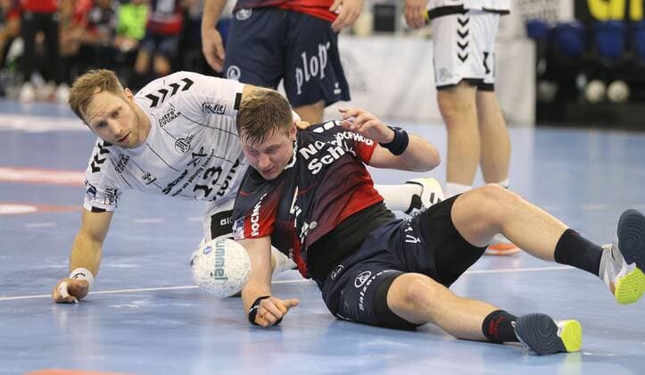 Photo Steffen Weinhold white against Goran Johannessen Flensburg Handball Men 1 Bundesliga at Do 12 09 2019 THW Kiel SG Flensburg 28 24