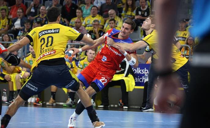 Handball, 1 Bundesliga Rhein Neckar Löwen HBW Balingen Weilstetten, 5 matchday on 12 09 2019, season 2019 20, ZmdZ, Ilija Abutovic 20, Rhein Neckar Löwen , Jona Schoch 22, Balingen Weilstetten against Niclas Kirkelokke 6, Rhein Neckar Löwen right, Rhein Neckar Löwen HBW Balingen Weilstetten