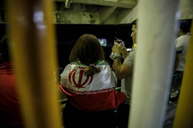 June 25, 2018, Tehran, Iran: Iranian women gather for a public viewing event at Azadi (freedom) Stadium in Tehran, Iran. to watch the 2018 FIFA World Cup, WM, Weltmeisterschaft, Fussball Russia Group B match between Iran and Portugal. Women are banned from attending male sporting events in Iran. Iran v Portugal : Group B-2018 FIFA World Cup Russia - ZUMAf146 20180625_zip_f146_002 Copyright: xRouzbehxFouladix
