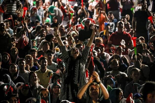 June 25, 2018, Tehran, Iran: Iranian women gather for a public viewing event at Azadi (freedom) Stadium in Tehran, Iran. to watch the 2018 FIFA World Cup, WM, Weltmeisterschaft, Fussball Russia Group B match between Iran and Portugal. Women are banned from attending male sporting events in Iran. Iran v Portugal : Group B-2018 FIFA World Cup Russia - ZUMAf146 20180625_zip_f146_009 Copyright: xRouzbehxFouladix