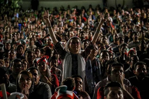 June 25, 2018, Tehran, Iran: Iranian women gather for a public viewing event at Azadi (freedom) Stadium in Tehran, Iran. to watch the 2018 FIFA World Cup, WM, Weltmeisterschaft, Fussball Russia Group B match between Iran and Portugal. Women are banned from attending male sporting events in Iran. Iran v Portugal : Group B-2018 FIFA World Cup Russia - ZUMAf146 20180625_zip_f146_012 Copyright: xRouzbehxFouladix