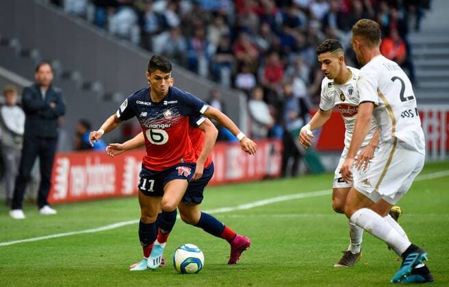 Fußball, OSC Lille - SCO Angers Luiz Araujo ( LOSC ) - Rayan Ait Nouri( Angers ) FOOTBALL : Lille OSC vs Angers SCO - Ligue 1 - Lille - 13 09 2019 FedericoPestellini Panoramic 