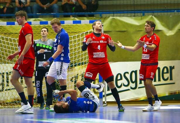 Tension at Jan Asmuth Bietigheim and Patrick Rentschler Bietigheim, from r , on floor Gabriel De Santis Aue Handball 2 Liga 2019 20 EHV Aue SG BBM Bietigheim on 13 9 2019 EHV Aue BBM Bietigheim