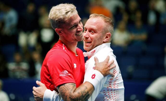 TENNIS - Davis Cup, FIN vs AUT ESPOO,FINLAND,14.SEP.19 - TENNIS - ITF Davis Cup, first round, Finland vs Austria. Image shows the rejoicing of Dennis Novak and captain Stefan Koubek (AUT). GEPAxpictures xMatthiasxHauer