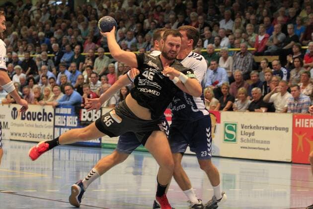 2 Bundesliga Handball VfL Luebeck Schwartau HC Elbflorenz 2006 14 09 2019, Hansehalle Luebeck, GER, VfL Luebeck Schwartau HC Elbflorenz 2006 picture shows Jonas Thümmler Thuemmler HC Elbflorenz 2006 wins against Martin Waschul VfL Luebeck Schwartau and Janik Schrader VfL Luebeck Schwartau nordphotox xTauchnitz nph00059