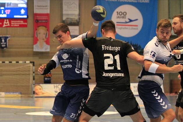 2 Bundesliga Handball VfL Luebeck Schwartau HC Elbflorenz 2006 14 09 2019, Hansehalle Luebeck, GER, VfL Luebeck Schwartau HC Elbflorenz 2006 picture shows Janik Schrader VfL Luebeck Schwartau is stopped by Philip Jungemann HC Elbflorenz 2006 nordphotox xTauchnitz nph00059