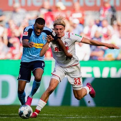 Köln, 14.09.2019 Alassane Plea (BMG), Sebastiaan Bornauw (Köln) 1. FC Köln - Borussia Mönchengladbach DFL regulations prohibit any use of photographs as image sequences and or quasi-video *** Cologne, 14 09 2019 Alassane Plea BMG , Sebastiaan Bornauw Köln 1 FC Köln Borussia Mönchengladbach DFL regulations prohibit any use of photographs as image sequences and or quasi video