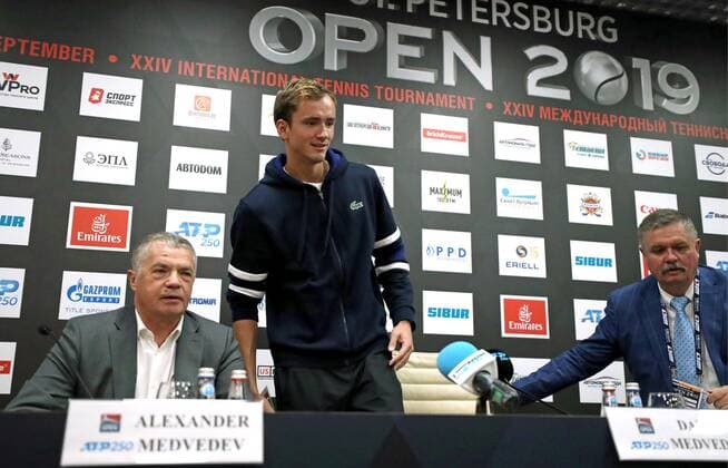 ST PETERSBURG, RUSSIA - SEPTEMBER 15, 2019: St Petersburg Open director general Alexander Medvedev, tennis player Daniil Medvedev and St Petersburg Open press centre director Mikhail Ivanov (L-R) at a press conference, PK, Pressekonferenz on the 24th St Petersburg Open, a tournament scheduled to start on September 16 at Sibur Arena as part of the 2019 ATP, Tennis Herren Tour. Alexander Demianchuk TASS  TS0BADF1