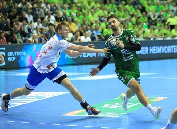 GER, DHB, 1 HBL, FUECHSE BERLIN VS TVB Stuttgart 15 09 2019, Max Schmeling Halle, Berlin, GER, DHB, 1 HBL, FUECHSE BERLIN VS TVB Stuttgart, DHB regulations prohibit any use of photographs as image sequences and or quasi video in picture Fabian Wiede Fuechse Berlin 3 , Adam Loenn Stuttgart 11 nordphotox xEngler nph00076