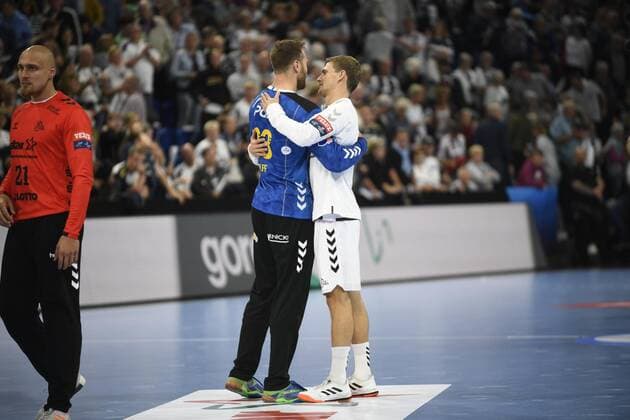 Rune Dahmke THW Kiel embraces Andreas Wolff Kielce , Handball, Men, THW Kiel vs PGE Vive Kielce, Champions League, 1 matchday, group stage, 15 09 19 Kiel Sparkassen Arena Schleswig Holstein Germany