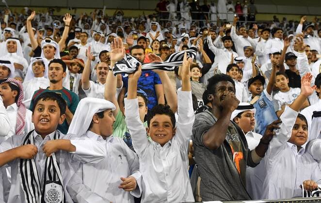 (190917) -- DOHA, Sept. 17, 2019 -- Fans of Qatar s Al Sadd cheer for the team during the second leg of the quarterfinal match between Saudi s Al-Nassr and Qatar s Al-Sadd at the AFC Champions League in Doha, capital of Qatar, Sept. 16, 2019. Al Sadd won the match 3-1 and qualified to the semifinal on a 4-3 aggregate score. (Photo by Nikku Xinhua) (SP)QATAR-DOHA-SOCCER-AFC CHAMPIONS LEAGUE-QUARTERFINAL yangyuanyong 
