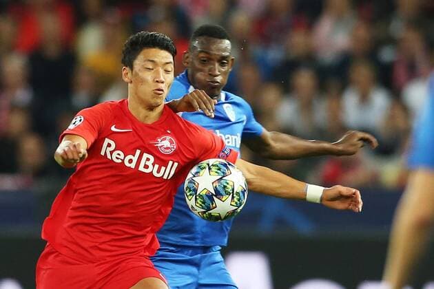 SOCCER - CL, RBS vs Genk SALZBURG,AUSTRIA,17.SEP.19 - SOCCER - UEFA Champions League, group stage, Red Bull Salzburg vs KRC Genk. Image shows Hee Chan Hwang (RBS) and Jhon Lucumi (Genk). GEPAxpictures xMathiasxMandl