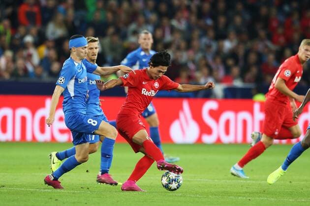 SOCCER - CL, RBS vs Genk SALZBURG,AUSTRIA,17.SEP.19 - SOCCER - UEFA Champions League, group stage, Red Bull Salzburg vs KRC Genk. Image shows Bryan Heynen (Genk) and Takumi Minamino (RBS). GEPAxpictures xMathiasxMandl