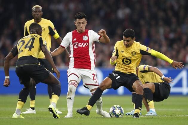 (l-r) Boubakary Soumare of Lille OSC, Lisandro Martinez of Ajax, Arton Zekaj of Lille OSC during the UEFA Champions League group H match between Ajax Amsterdam and Lille OSC at the Johan Cruijff Arena on September 17, 2019 in Amsterdam, The Netherlands UEFA Champions League 2019 2020 xVIxVIxImagesx xMauricexvanxSteenxIVx 202152873