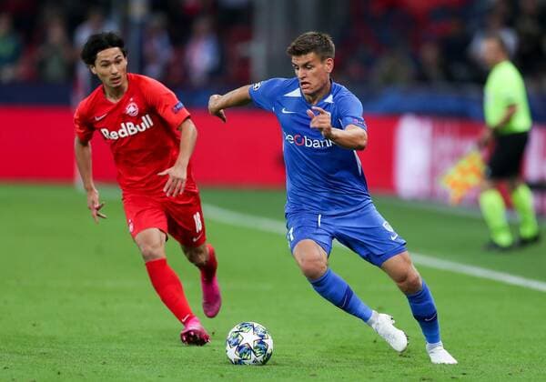 SOCCER - CL, RBS vs Genk SALZBURG,AUSTRIA,17.SEP.19 - SOCCER - UEFA Champions League, group stage, Red Bull Salzburg vs KRC Genk. Image shows Takumi Minamino (RBS) and Joakim Maehle (Genk). GEPAxpictures xPatrickxSteiner