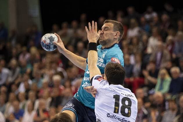 SG Flensburg Handewitt vs. Elverum Handball, Handball, EHF Champions League Group Phase, 18 09 19 Michel Jurecki SG Flensburg Handewitt, 55 vs. Jonas Burud Elverum Handball, 18 Copyright: xBEAUTIFULxSPORTS MarioxM.xKobergx