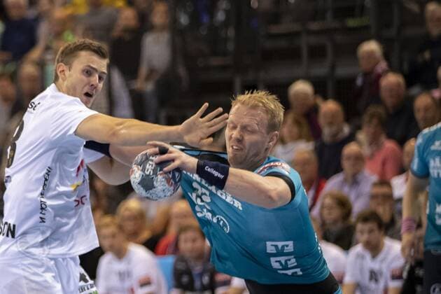 SG Flensburg Handewitt vs. Elverum Handball, Handball, EHF Champions League Group Phase, 18 09 19 Anders Zachariassen SG Flensburg Handewitt, 22 vs. Jonas Burud Elverum Handball, 18 Copyright: xBEAUTIFULxSPORTS MarioxM.xKobergx