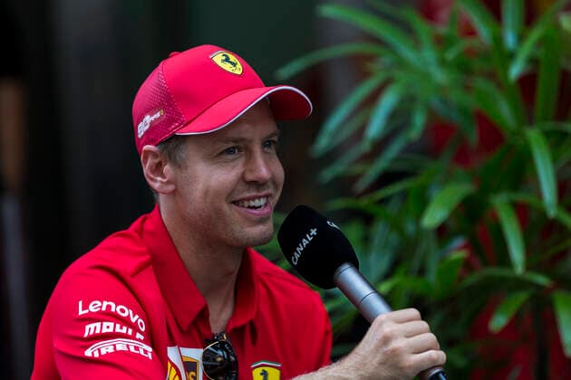 19th September 2019; The Marina Bay Circuit, Marina Bay, Singapore; Formula One, Arrival Day; The number 5 Scuderia Ferrari driver Sebastian Vettel  ActionPlus12168703 StephenxBlackberry