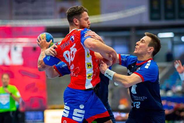 Bietigheim, Germany 25 August 2019 2 BL 19 20 SG BBM Bietigheim vs ThSV Eisenach v left in duel Alexander Saul Eisenach and Martin Marcec SG BBM Bietigheim Bietigheim Egetrans Arena Baden Württemberg Germany