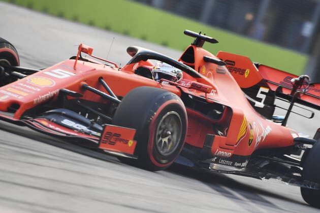 (190921) -- SINGAPORE, Sept. 21, 2019 (Xinhua) -- German driver Sebastian Vettel of Ferrari drives during the third practice session of the Formula One Singapore Grand Prix held at the Marina Bay Street Circuit in Singapore, on Sept. 21, 2019. (Xinhua Then Chih Wey) (SP)SINGAPORE-F1-GRAND PRIX-PRACTICE SESSION 
