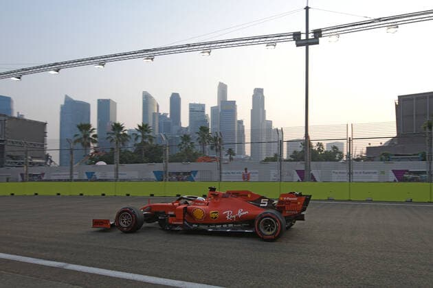 (190921) -- SINGAPORE, Sept. 21, 2019 (Xinhua) -- German driver Sebastian Vettel of Ferrari drives during the third practice session of the Formula One Singapore Grand Prix held at the Marina Bay Street Circuit in Singapore, on Sept. 21, 2019. (Xinhua Then Chih Wey) (SP)SINGAPORE-F1-GRAND PRIX-PRACTICE SESSION 