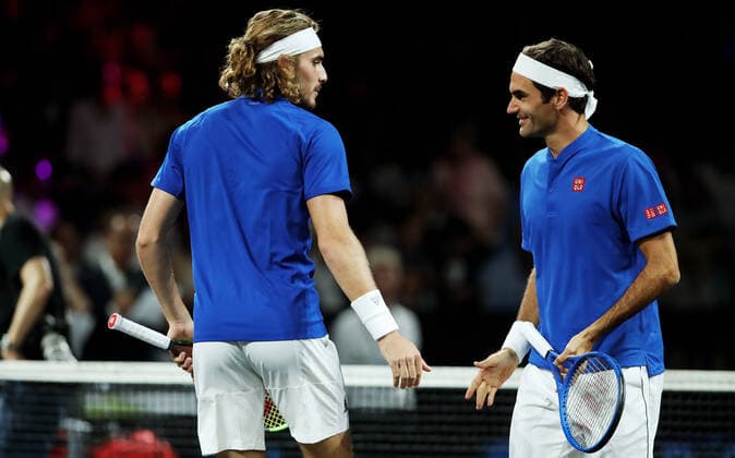 TENNIS - Laver Cup 2019 GENEVA,SWITZERLAND,22.SEP.19 - TENNIS - Laver Cup, Team Europe vs Team World. Image shows Stefanos Tsitsipas (GRE) and Roger Federer (SUI). GEPAxpictures xMatthiasxHauer