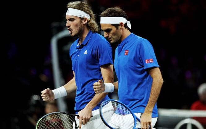 TENNIS - Laver Cup 2019 GENEVA,SWITZERLAND,22.SEP.19 - TENNIS - Laver Cup, Team Europe vs Team World. Image shows Stefanos Tsitsipas (GRE) and Roger Federer (SUI). GEPAxpictures xMatthiasxHauer