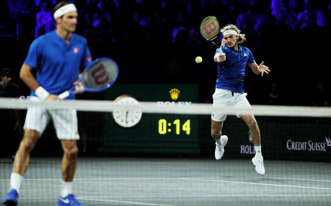 TENNIS - Laver Cup 2019 GENEVA,SWITZERLAND,22.SEP.19 - TENNIS - Laver Cup, Team Europe vs Team World. Image shows Roger Federer (SUI) and Stefanos Tsitsipas (GRE). GEPAxpictures xMatthiasxHauer