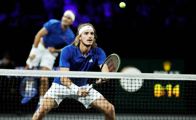 TENNIS - Laver Cup 2019 GENEVA,SWITZERLAND,22.SEP.19 - TENNIS - Laver Cup, Team Europe vs Team World. Image shows Roger Federer (SUI) and Stefanos Tsitsipas (GRE). GEPAxpictures xMatthiasxHauer