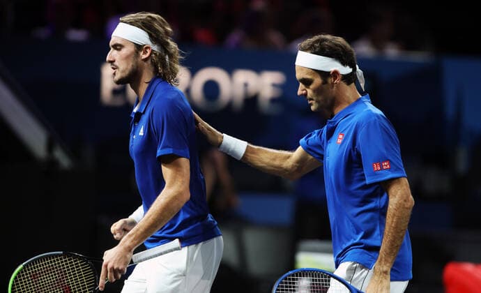 TENNIS - Laver Cup 2019 GENEVA,SWITZERLAND,22.SEP.19 - TENNIS - Laver Cup, Team Europe vs Team World. Image shows Stefanos Tsitsipas (GRE) and Roger Federer (SUI). GEPAxpictures xMatthiasxHauer