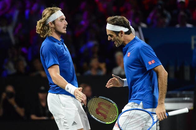 September 22, 2019, Geneva, Switzerland: ROGER FEDERER and STEFANOS TSITSIPAS playing doubles in the Laver Cup tennis event in Geneva Switzerland. Tennis 2019: Laver Cup Day 3 - ZUMAl132 20190922_zap_l132_006 Copyright: xChristopherxLevyx
