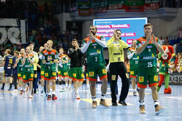 22 09 2019, xtgx, Handball Liqui Moly HBL, SC Magdeburg Rhein Neckar Loewen emspor, v l Magdeburgs players around Zeljko Musa Magdeburg, 2 , Jannick Green Krejberg Magdeburg, 16 and Marko Bezjak Magdeburg, 25 thank the fans, disappointed, looks disappointed, knocked down, disappointed GETEC Arena