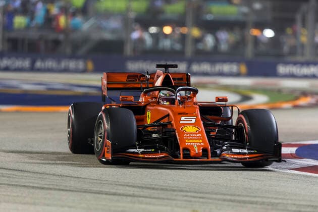 22nd September 2019; The Marina Bay Circuit, Marina Bay, Singapore; Formula One, Race Day; The number 5 Scuderia Ferrari driver Sebastian Vettel during the race  ActionPlus12170598 StephenxBlackberry