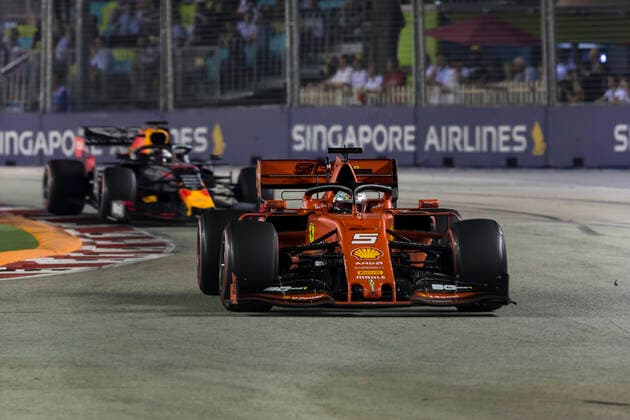 22nd September 2019; The Marina Bay Circuit, Marina Bay, Singapore; Formula One, Race Day; The number Sebastian Vettel, Max Verstappen during the race  ActionPlus12170640 StephenxBlackberry