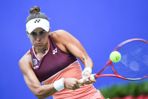 (190923) -- WUHAN, Sept. 23, 2019 -- Monica Puig of Puerto Rico returns a shot during the women s singles first round match between Monica Puig of Puerto Rico and Angelique Kerber of Germany at the 2019 WTA, Tennis Damen Wuhan Open tennis tournament in Wuhan of central China s Hubei Province, on Sept. 23, 2019. ) (SP)CHINA-WUHAN-WTA-TENNIS-WUHAN OPEN (CN) ChengxMin 