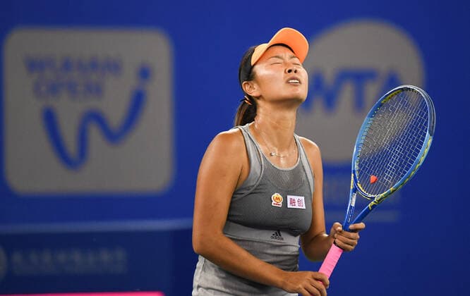(190923) -- WUHAN, Sept. 23, 2019 -- Peng Shuai of China reacts during the women s singles first round match between Garbine Muguruza of Spain and Peng Shuai of China at the 2019 WTA, Tennis Damen Wuhan Open tennis tournament in Wuhan of central China s Hubei Province, Sept. 23, 2019. ) (SP)CHINA-WUHAN-WTA-TENNIS-WUHAN OPEN (CN) ChengxMin 