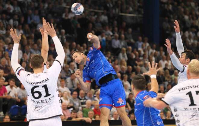 Photo Scored by Marko Panic against Hendrik Pekeler Kiel , 61 Handball Men Champions League at Mi 25 09 2019 THW Kiel HC Meshkov Brest