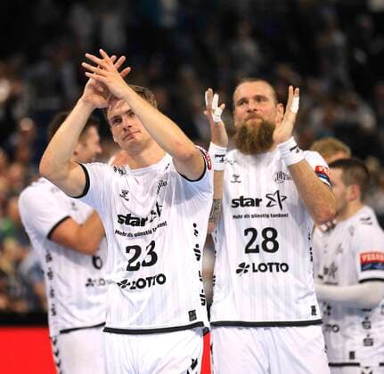 Photo Victory celebration at Rune Dahmke Kiel and right Pavel Horak Handball Mens Champions League at Mi 25 09 2019 THW Kiel HC Meshkov Brest 31 23