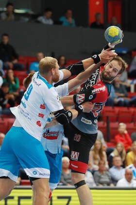 Nico Buedel HC Erlangen vs. Manuel Spaeth TVB 1898 Stuttgart TVB 1898 Stuttgart HC Erlangen, DHB Cup, 1 8 Final on 25 09 2019 Stuttgart Copyright: xEIBNER Benjamin_Laux EP_BLU