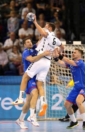 Photo Harald Reinkind Kiel scoring against Marko Panic , left Handball Men Champions League at Mi 25 09 2019 THW Kiel HC Meshkov Brest 30 23